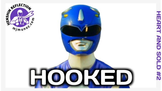 Thumbnail for Henshin Reflection – Heart and Sold Episode 2. The Mighty Morphin Blue Ranger helmet appears centered on a clean white background, with the purple Henshin Reflection stamp logo in the top-left corner and “HEART AND SOLD #2” vertically on the right. The bold title “HOOKED” sits across the bottom.