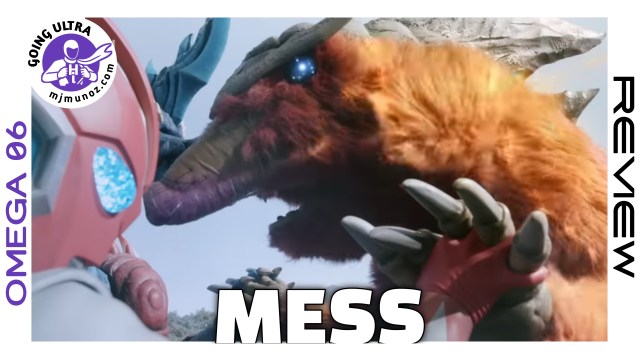 Ultraman Omega locks hands with a horned kaiju during a close-quarters power struggle