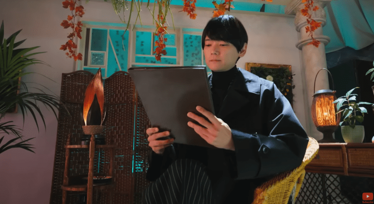 Nox / Odaka reviewing information on a tablet inside the Lady’s hidden domain in Kamen Rider Zeztz Episode 16