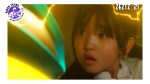 A frightened young girl looks up at Kamen Rider Zeztz as yellow lightning arcs around them during a critical moment in Episode 21.