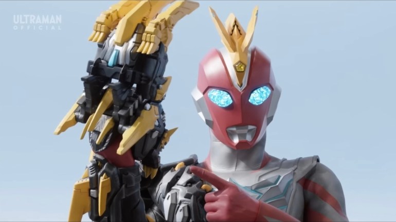 Ultraman Omega points forward while raising a gold and black Trigaron armored arm