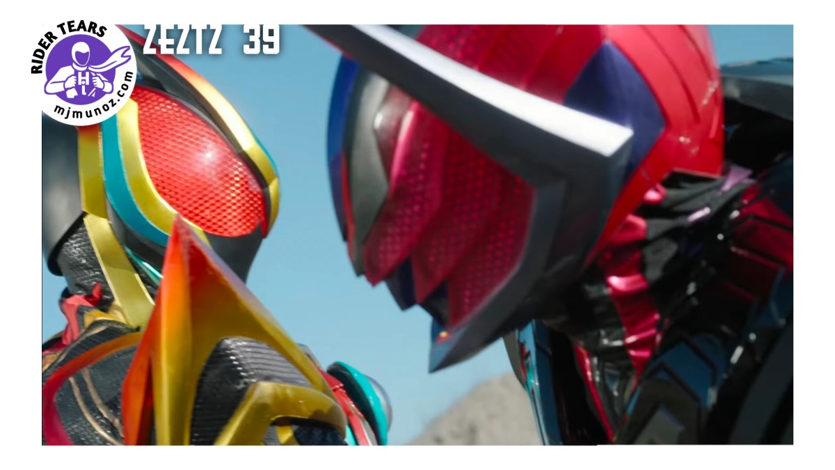 Close-up confrontation between Kamen Rider Zeztz and Sieg as the two Riders stare each other down before battle in Kamen Rider Zeztz Episode 39.