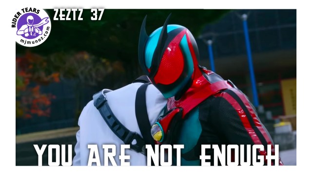 Kamen Rider Zeztz embraces another Odaka Nox during an emotional scene in Episode 37 as themes of identity and self worth come to the forefront.