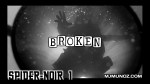 Spider Noir silhouette reflected through glass with the word "BROKEN" in the center.