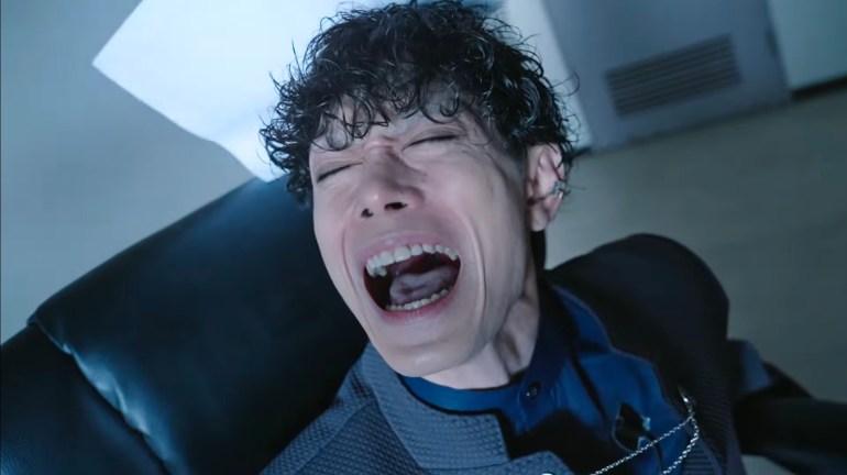 Agent Three screams in pain as he meets his end during Kamen Rider Zeztz Episode 38.