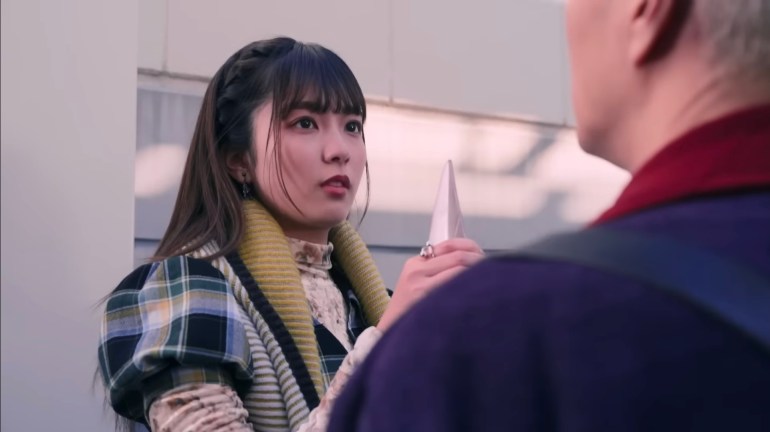 Nem holds Sieg's sword in Kamen Rider Zeztz Episode 43 as she confronts the unsettling possibility that the nightmare villain understands a painful truth about her.