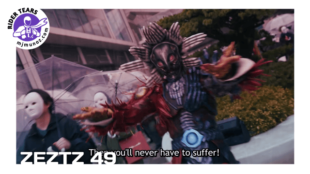 Oblivion surrounded by masked people and monstrous figures charging forward through a city in Kamen Rider Zeztz 49.