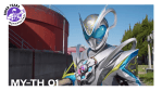 Kamen Rider My-Th stands outdoors in his silver, blue, and black mouse-themed Rider suit.