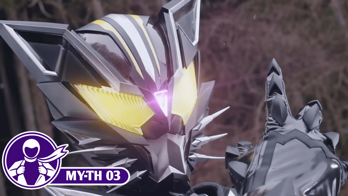 Close-up of Kamen Rider Rid with glowing yellow eyes and a pink light on his forehead as he raises one hand.