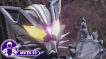 Close-up of Kamen Rider Rid with glowing yellow eyes and a pink light on his forehead as he raises one hand.