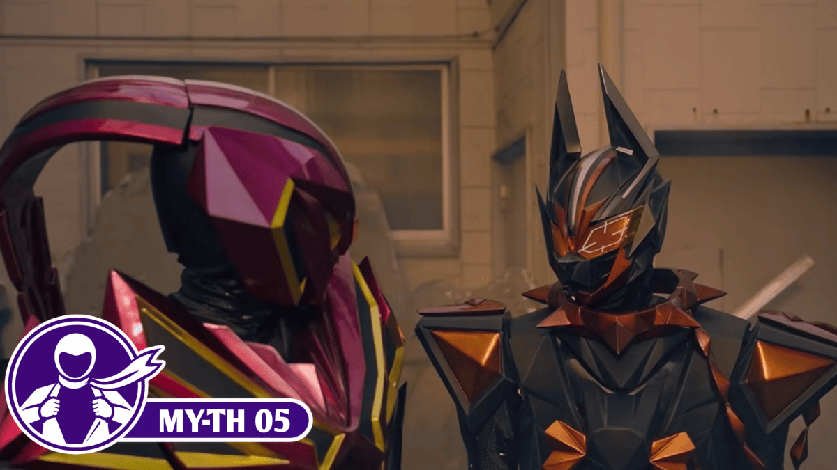 Vanken, in black and bronze armor, faces Jyao in magenta armor inside a damaged building.