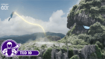 Ultraman Teo floats in the sky, firing a thin, glowing yellow beam toward the enormous, rocky, vegetation-covered face of Ozuyanushi on a mountainside.